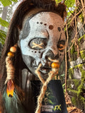 Latex Shrunken Head with Black/Brown Feathers