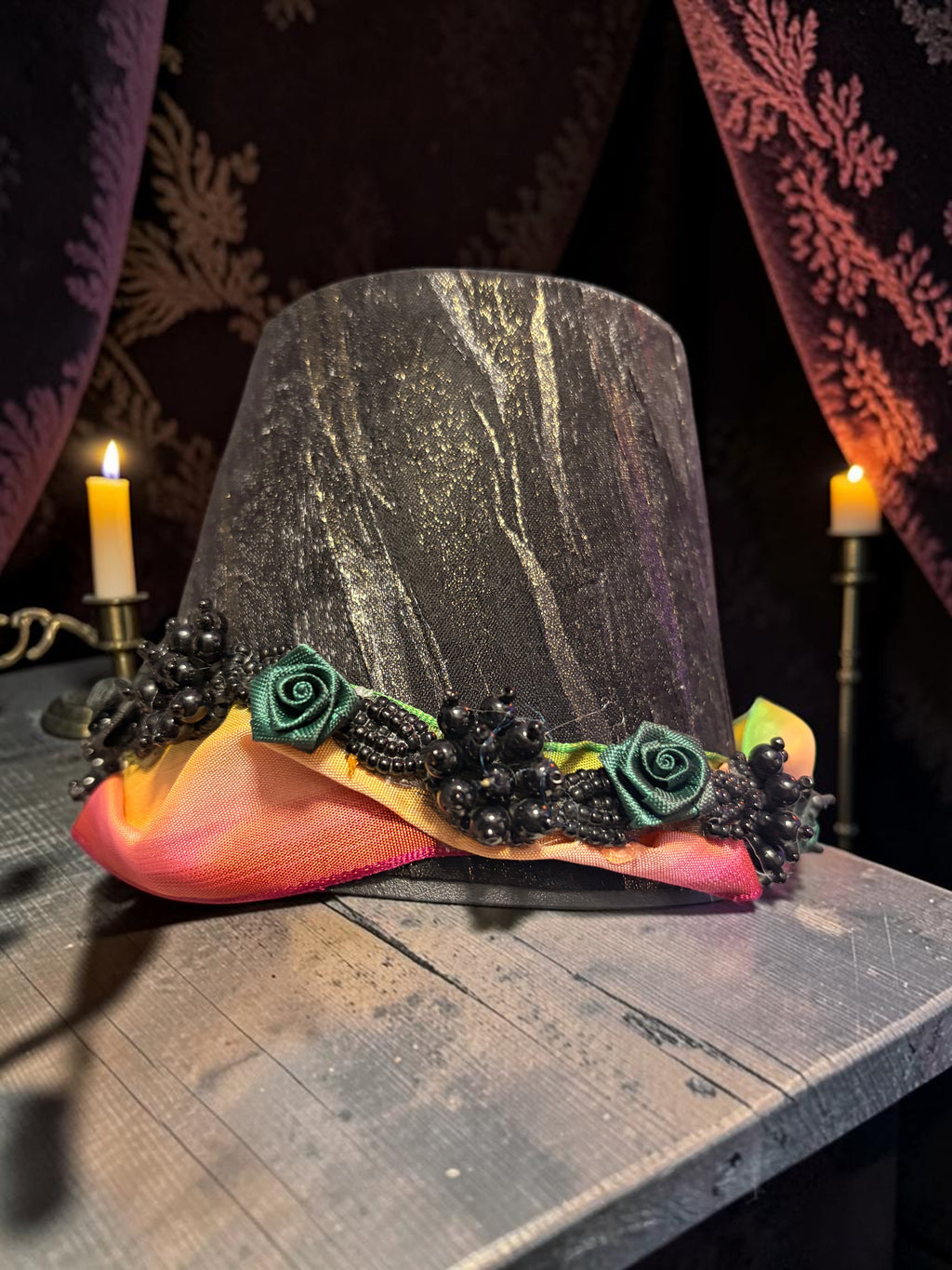 Halloween-Emporium Couture Poison Bottle Lamp with a black textured shade, green ribbon roses, and black bead trim.
