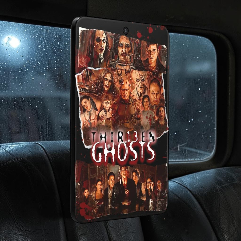Halloween-Emporium 13 Ghost air freshener with a cinematic horror collage design hanging in a car interior