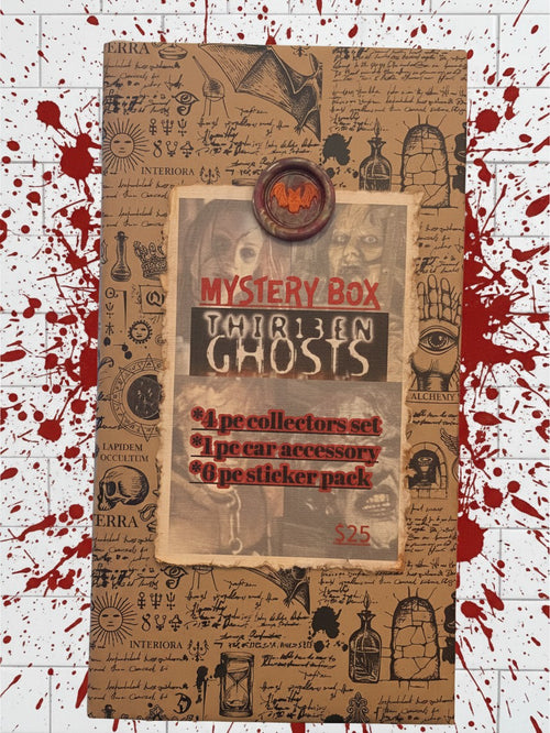 Halloween-Emporium 13 Ghosts mystery box with occult-themed wrapping, wax seal, and horror movie collector items.