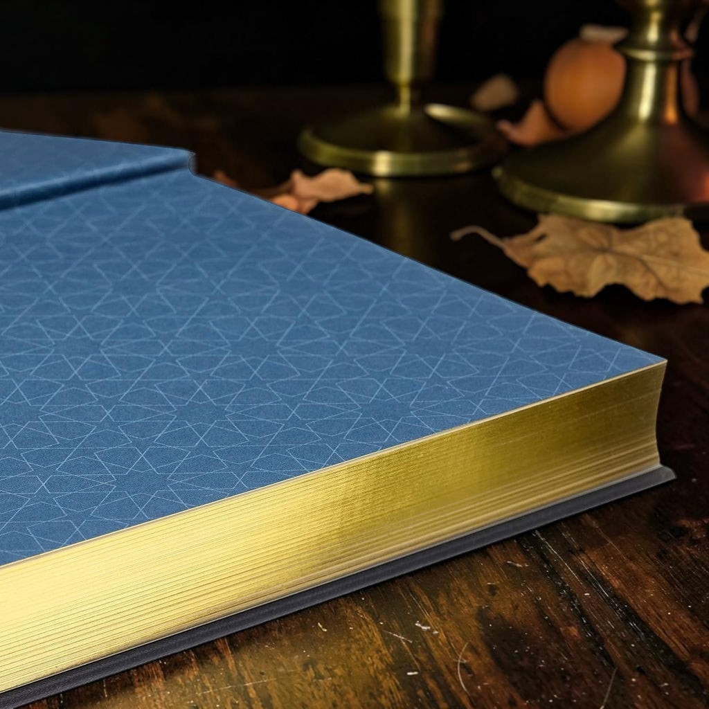 Halloween-Emporium Aleister Crowley Collection hardcover book with blue geometric cover and gilded page edges.