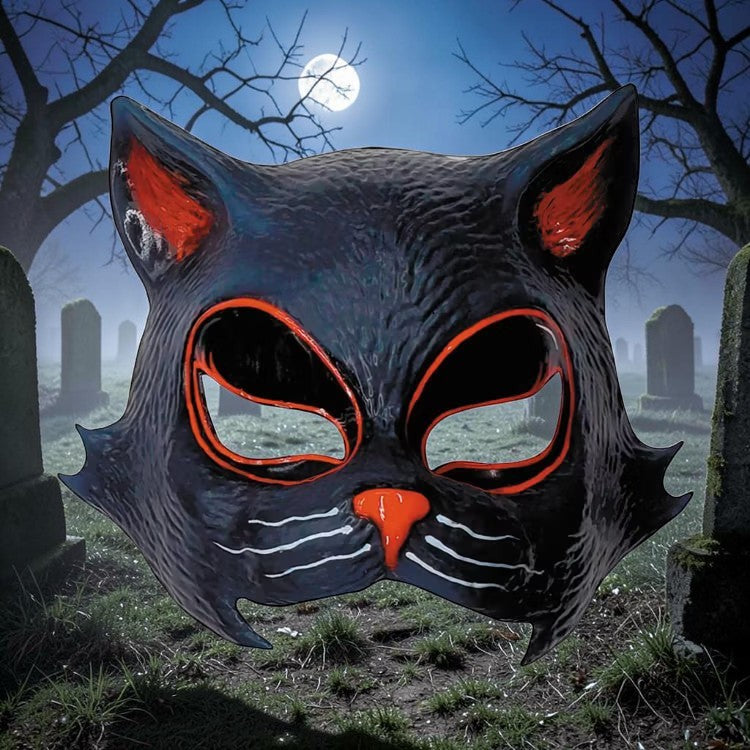 Halloween-Emporium Halloween Ends Allyson cat injection mask in black with orange accents against a graveyard backdrop