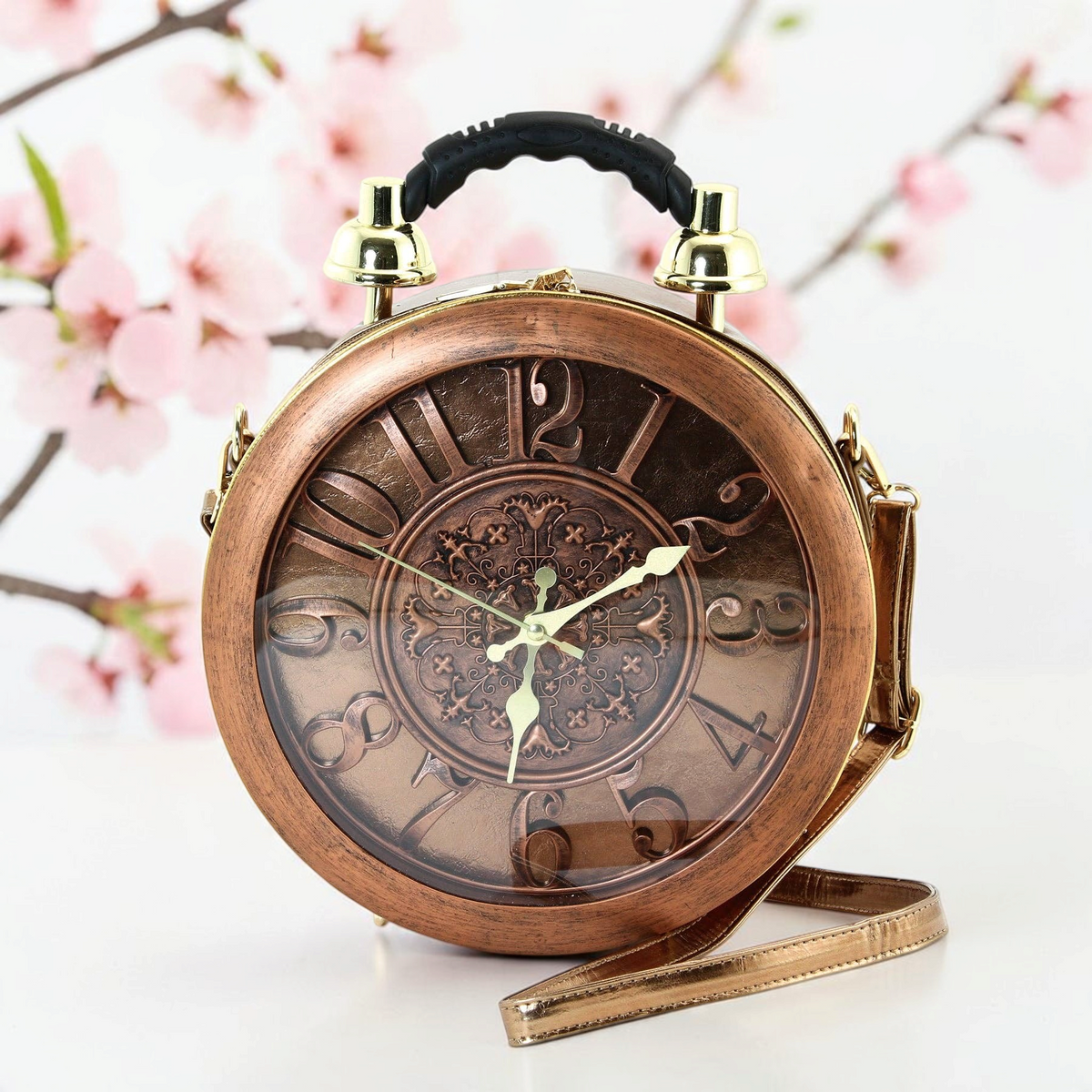 Halloween-Emporium antique clock bag in bronze vinyl with a protective cover, top handle, and shoulder strap.