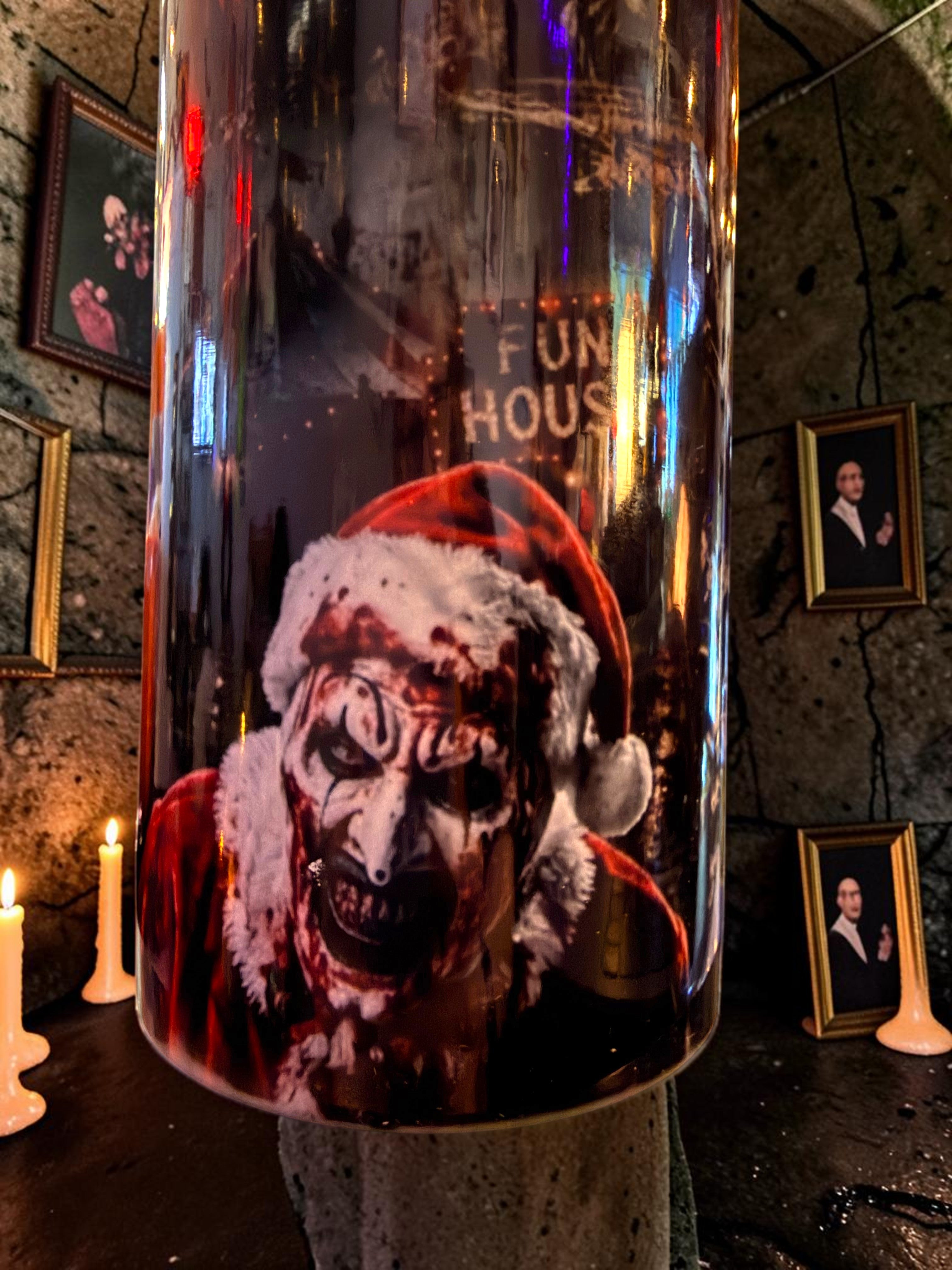 Halloween-Emporium 30oz Art tumbler featuring a dark, horror-themed Santa clown graphic with a funhouse background.