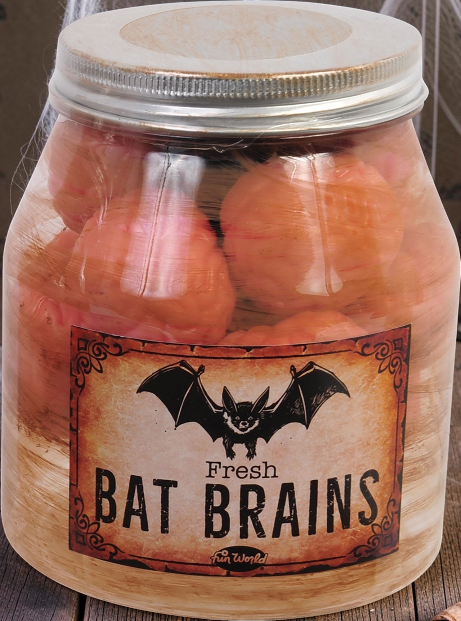 Halloween-Emporium decorative specimen jar containing pink bat brains with a vintage-style weathered label