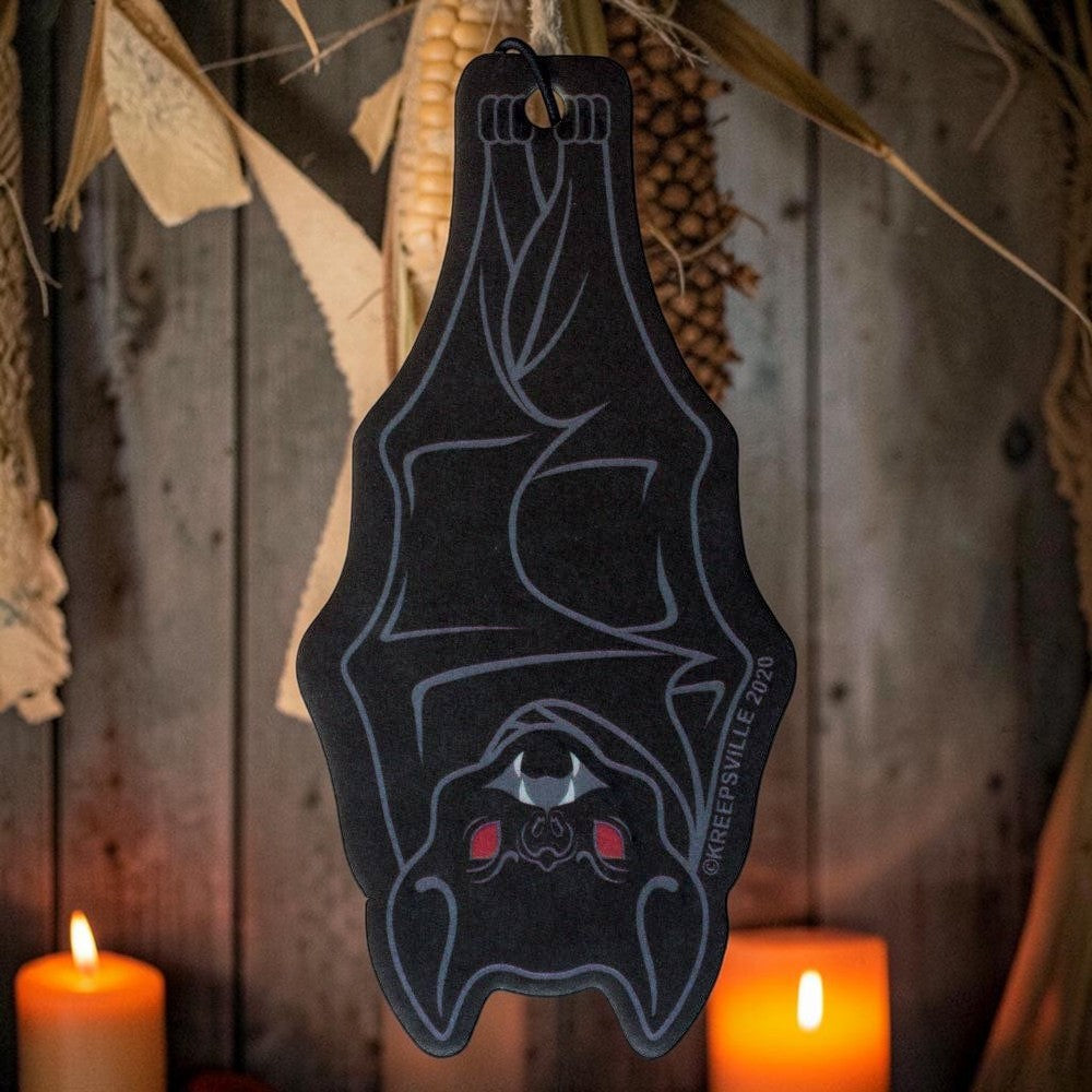 Halloween-Emporium bat-shaped hanging air freshener in black with red accents, featuring a spooky gothic design.