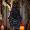 Halloween-Emporium bat-shaped hanging air freshener in black with red accents, featuring a spooky gothic design.