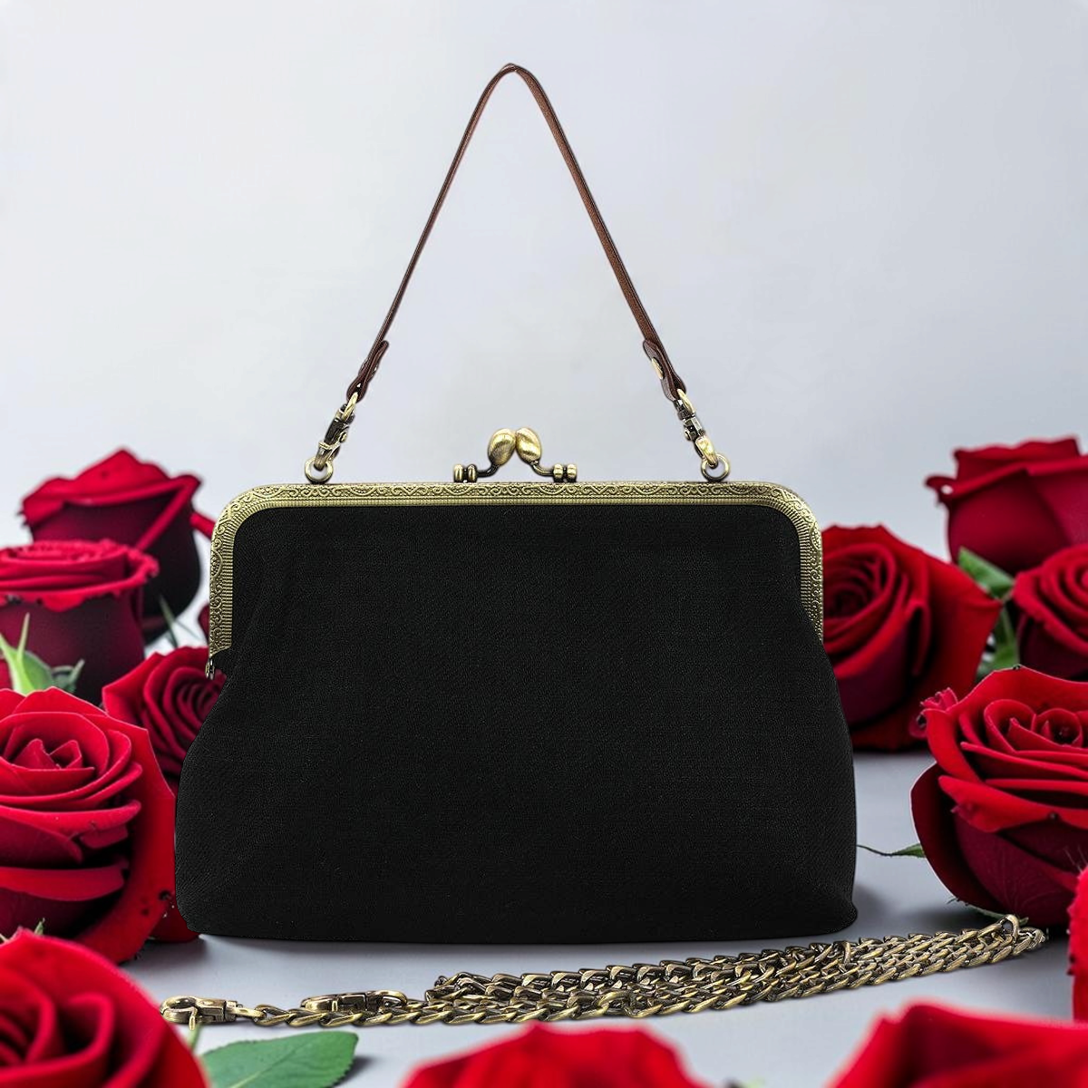 Halloween-Emporium black linen cotton kiss lock bag with antique metal frame, surrounded by red roses.