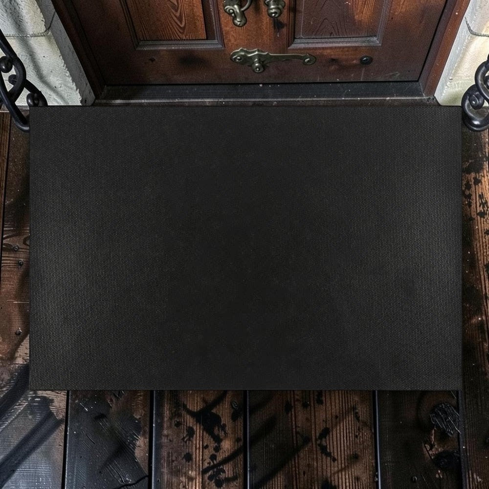 Halloween-Emporium Home Sweet Haunted Home natural grass doormat in black, rectangular shape for front porch decor.