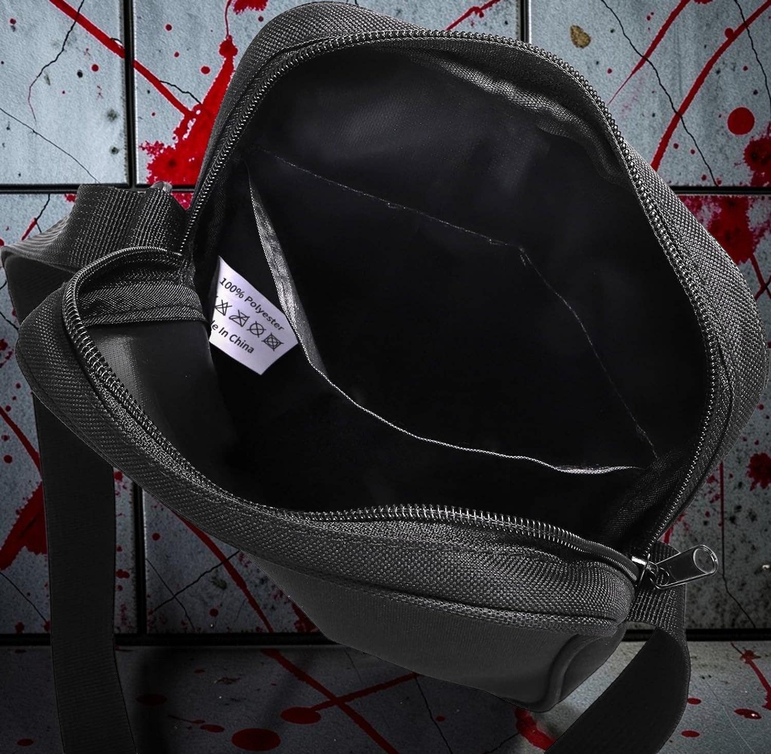 Halloween-Emporium black polyester messenger bag interior with zipper closure and internal pocket