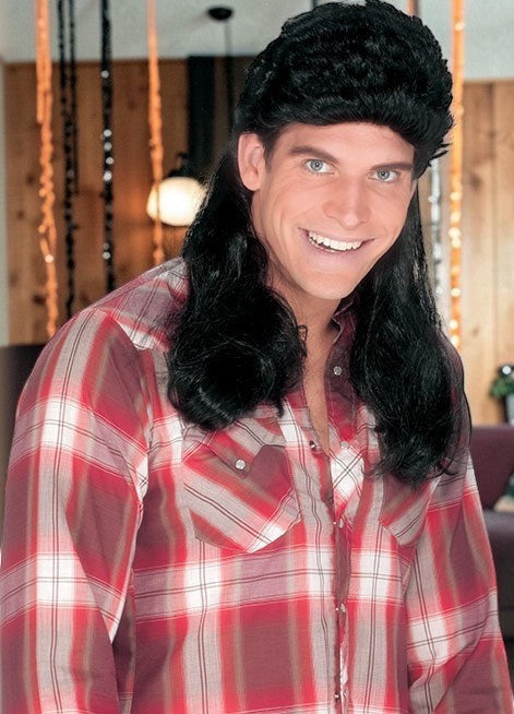 Halloween-Emporium classic black mullet costume wig worn by a smiling man in a red plaid shirt for an 80s theme.