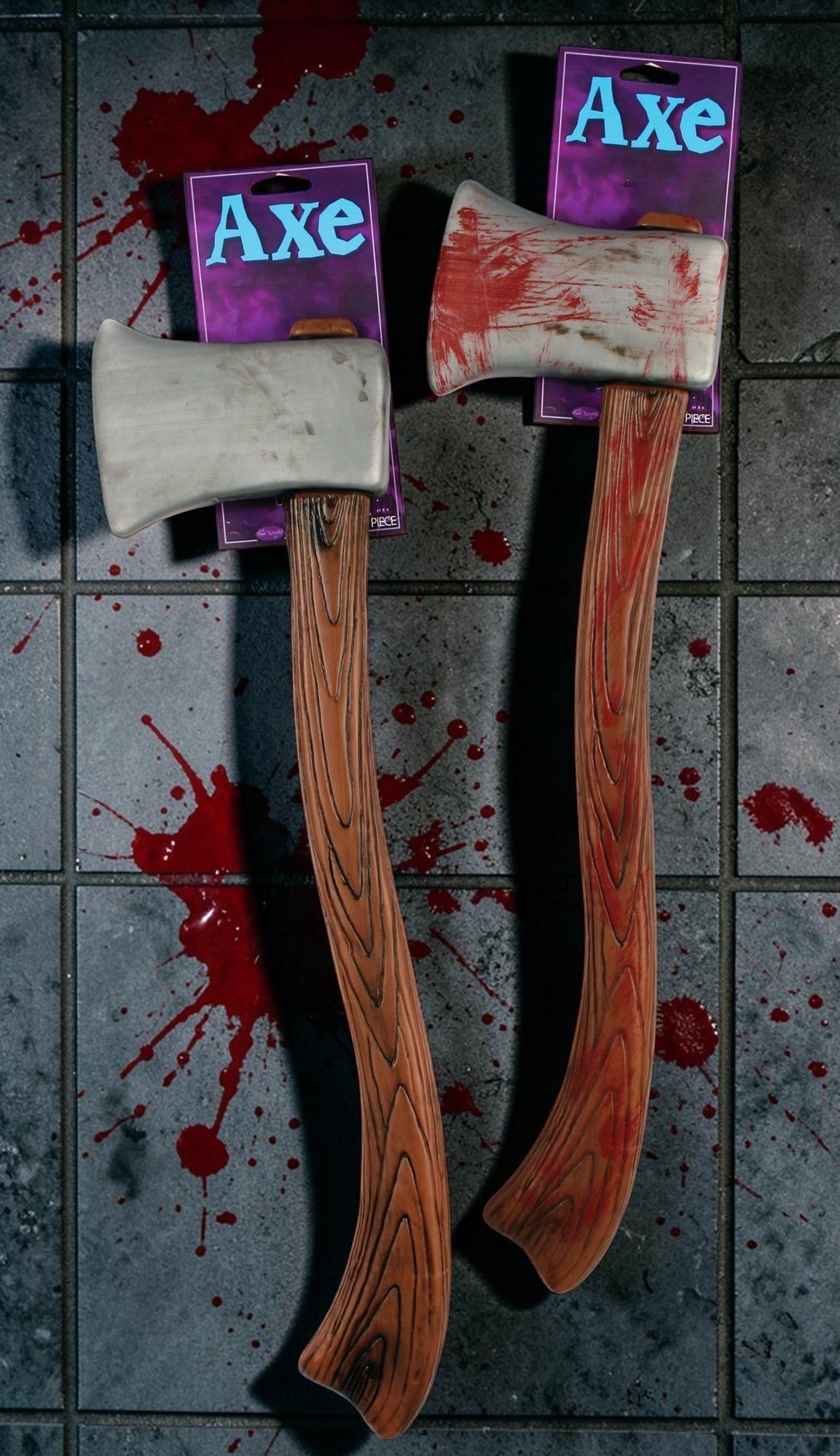 Halloween-Emporium plastic axe prop with weathered metallic blade, blood splatter, and wood-grain handle.