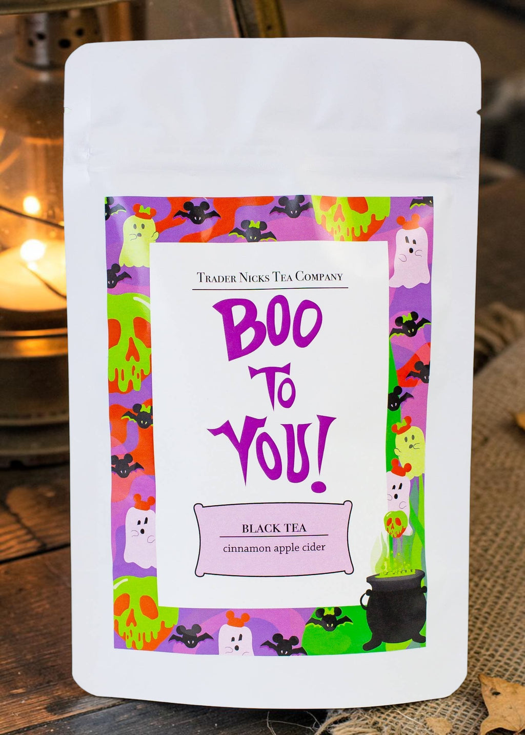 Halloween-Emporium Boo to You black tea pouch with festive green, purple, and orange label featuring ghosts and bats.