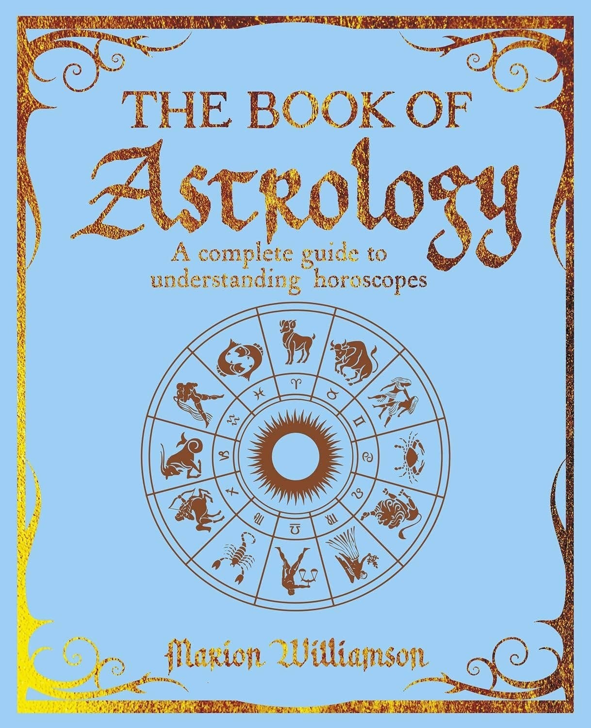 Halloween-Emporium Book of Astrology paperback with light blue cover, gold foil accents, and zodiac wheel illustration.