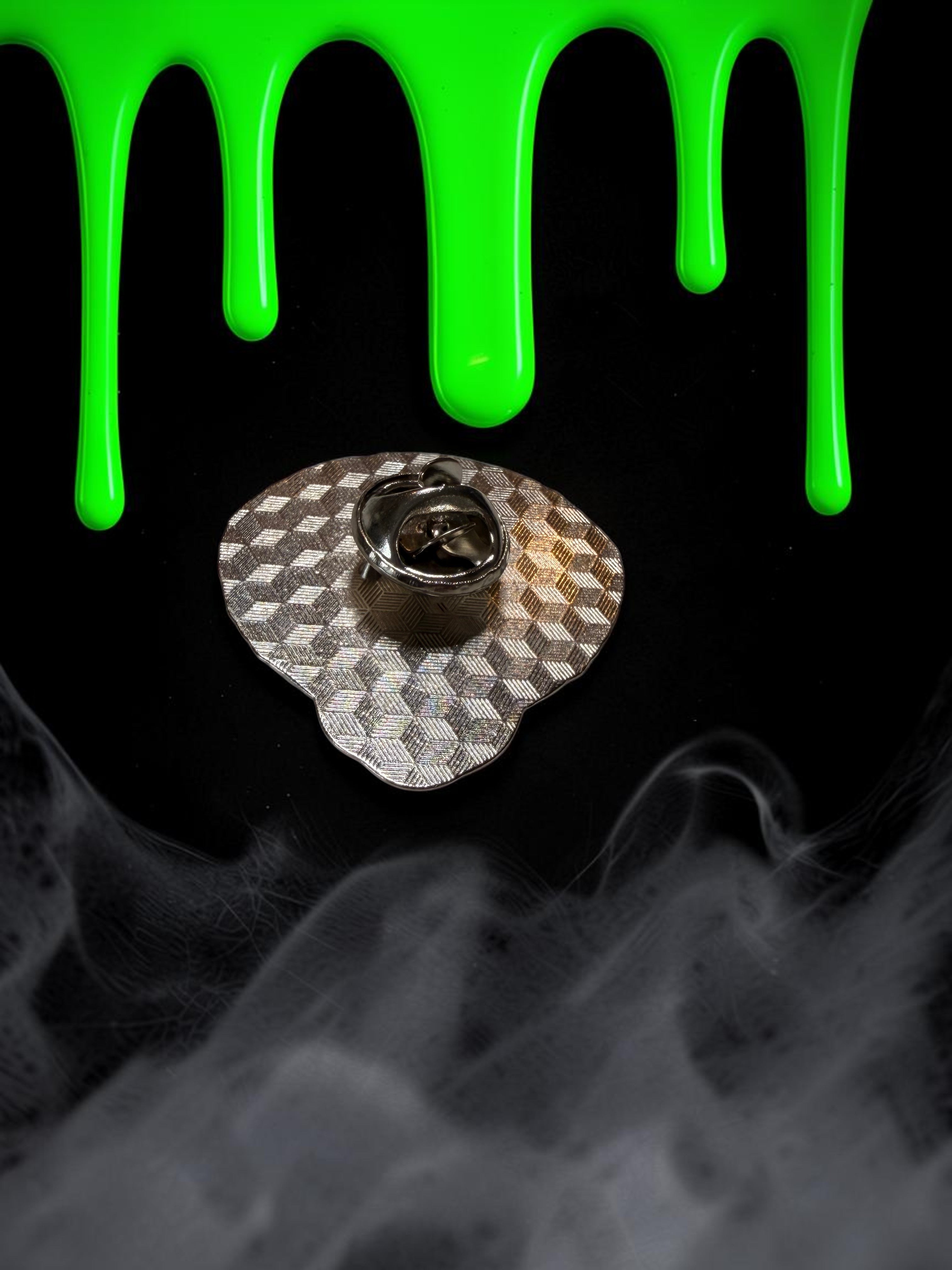 Halloween-Emporium Bride of Frankenstein enamel pin back view showing the metal butterfly clutch on a black background