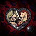 Halloween-Emporium Bride of Chucky heart-shaped embroidered back patch featuring Chucky and Tiffany on red velvet.