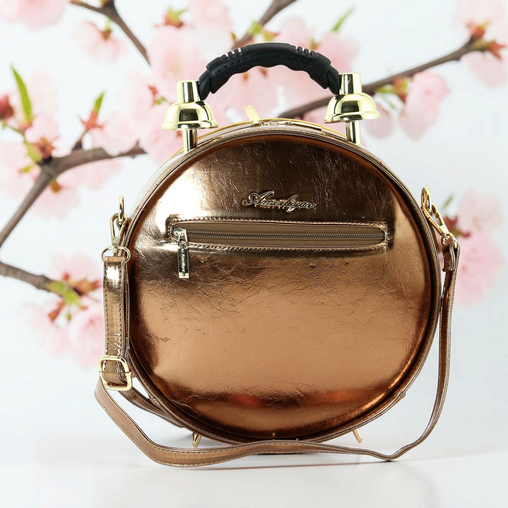 Halloween-Emporium antique clock bag in metallic bronze vinyl with a top handle and detachable shoulder strap.