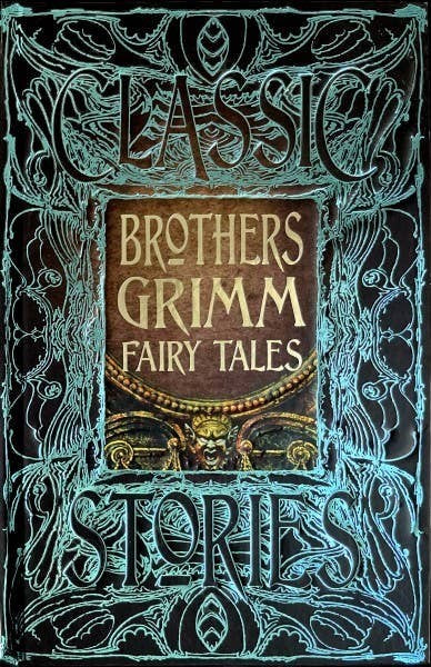 Halloween-Emporium Brothers Grimm Fairy Tales hardback book with ornate black and teal gothic cover art