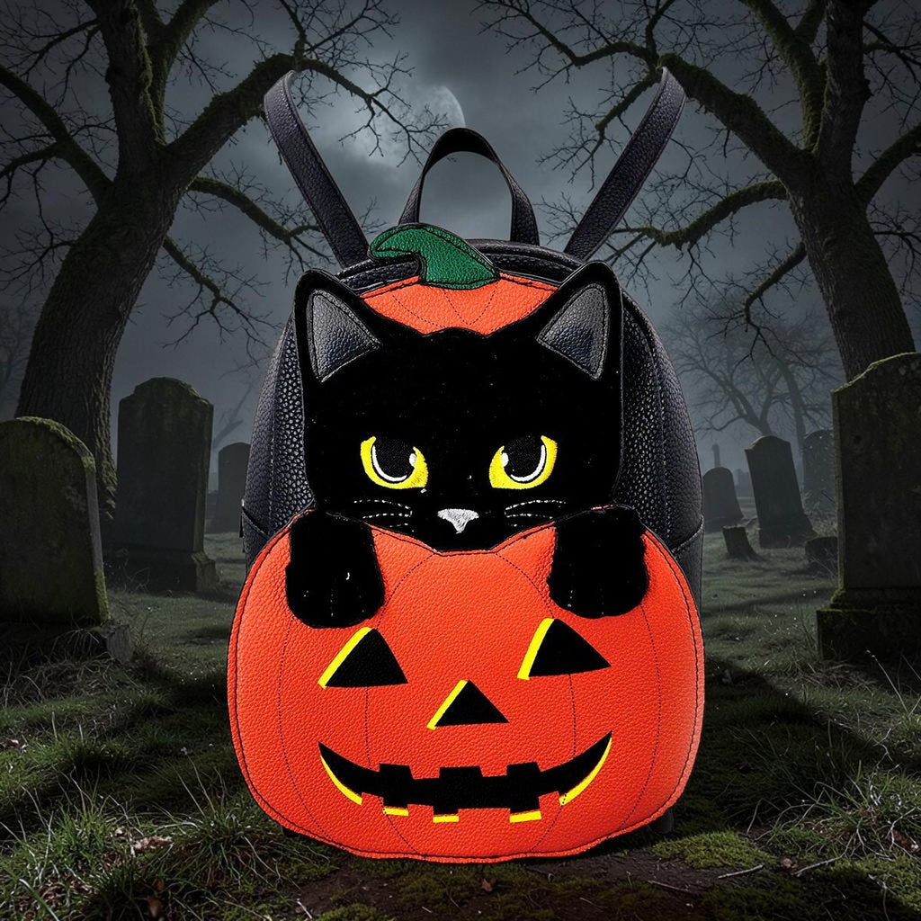 Halloween-Emporium faux leather mini backpack featuring a black cat peeking out of a bright orange jack-o'-lantern.
