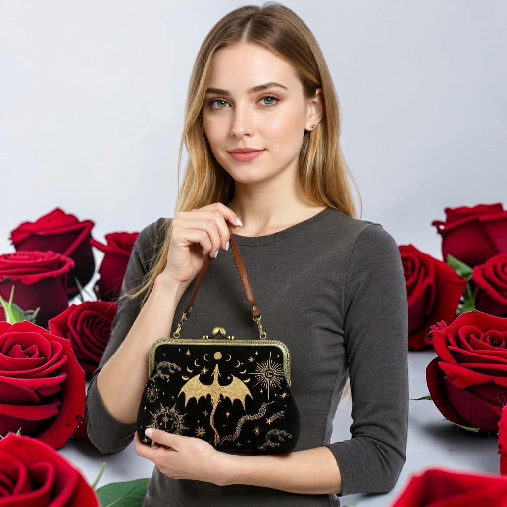 Halloween-Emporium celestial dragon kiss lock bag in black linen cotton with gold embroidery held by a woman