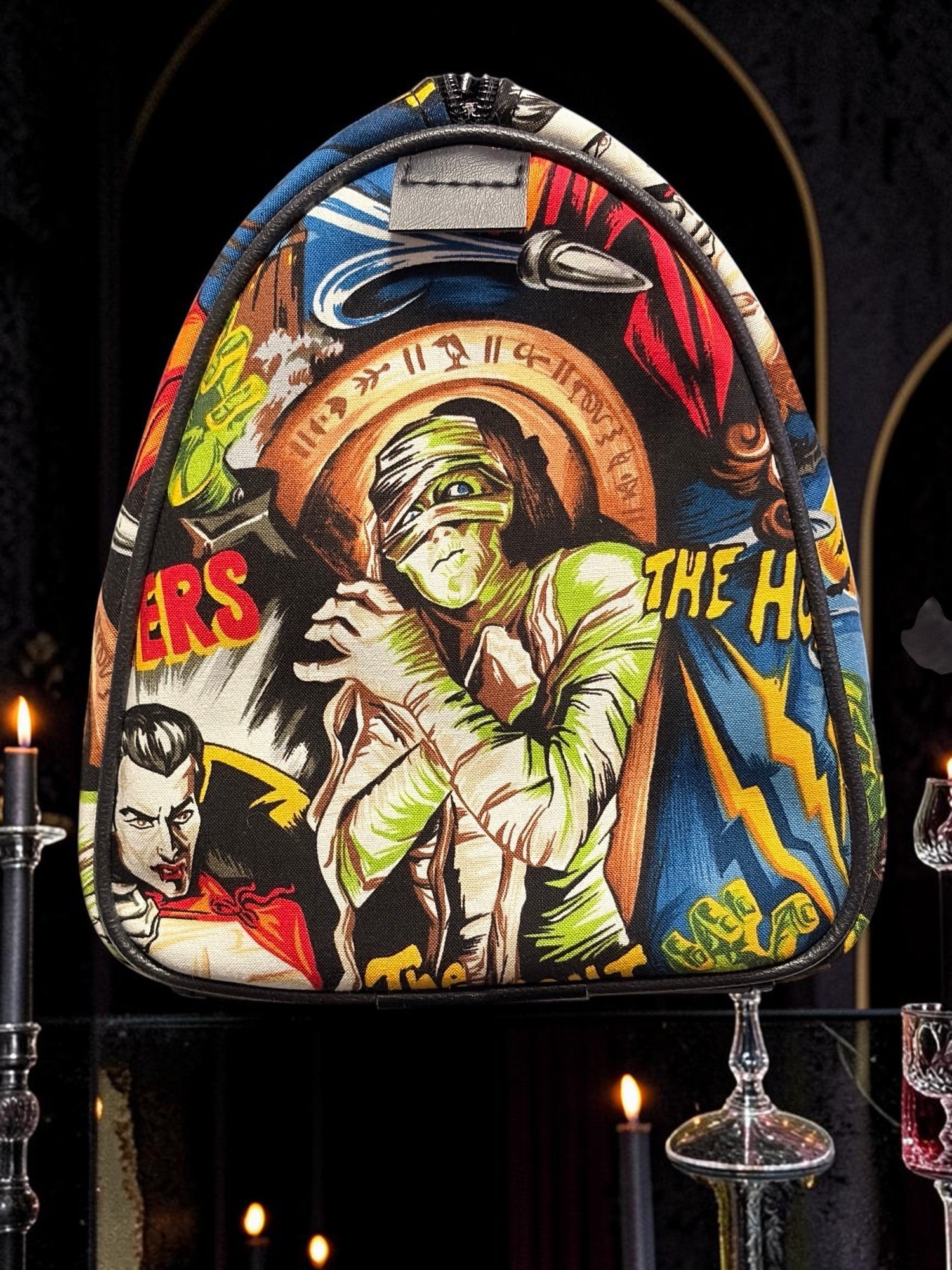 Halloween-Emporium classic horror handbag featuring vintage monster comic book art with a mummy and vampire design