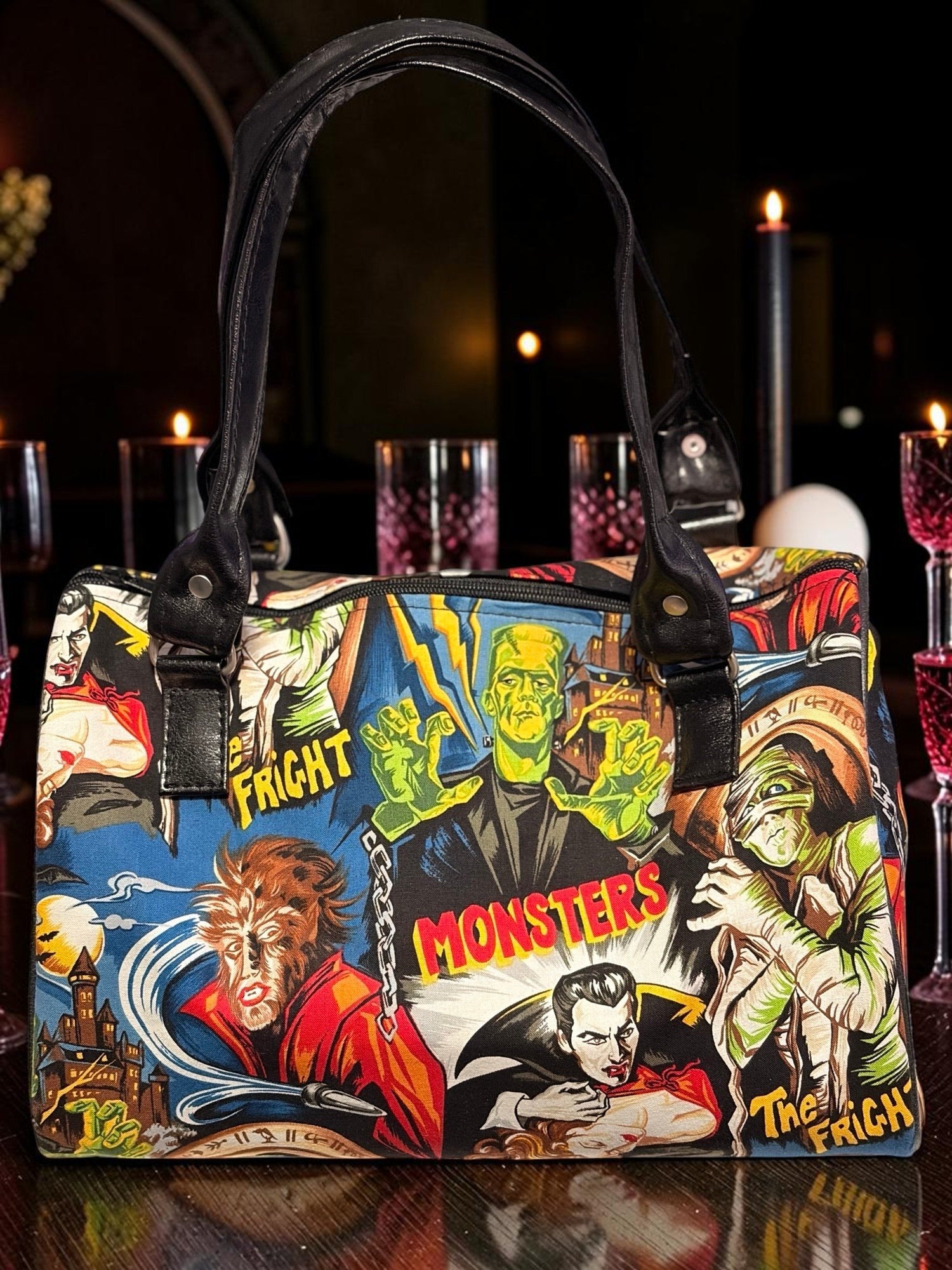 Halloween-Emporium classic horror handbag featuring vintage monster movie graphics in a vibrant comic book style