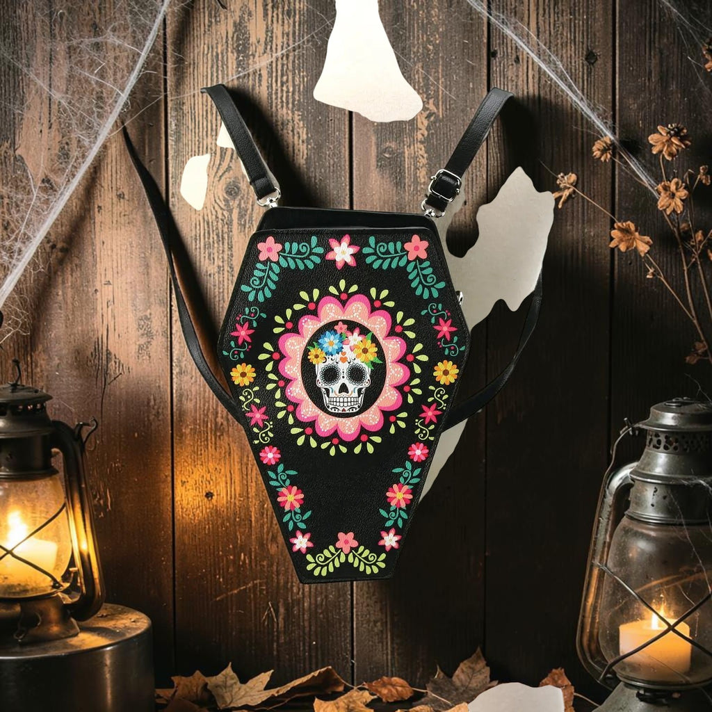 Halloween-Emporium coffin-shaped vinyl backpack with colorful sugar skull floral print, convertible to crossbody.