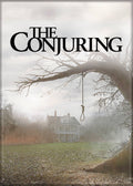 Halloween-Emporium The Conjuring movie poster magnet featuring a haunted farmhouse and tree in a misty landscape.