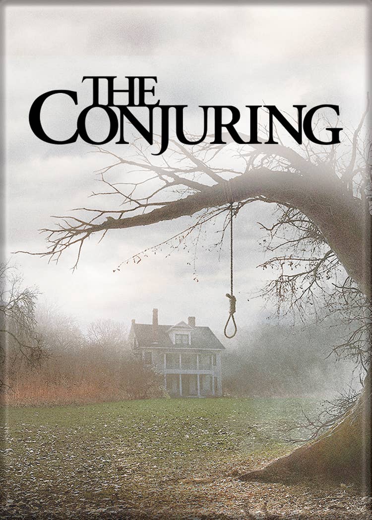Halloween-Emporium The Conjuring movie poster magnet featuring a haunted farmhouse and tree in a misty landscape.