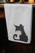 Halloween-Emporium white waffle-weave kitchen hand towel featuring a black grumpy cat silhouette design.