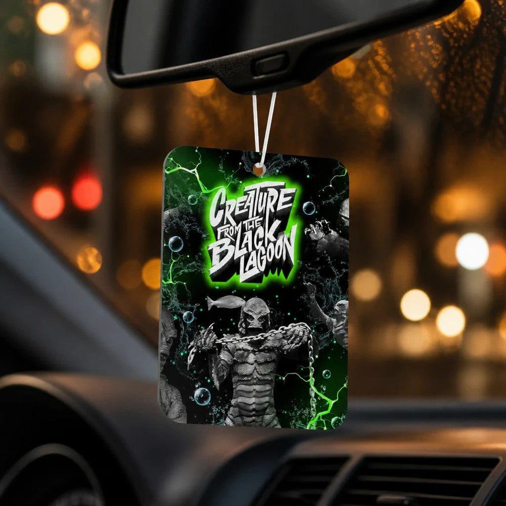 Halloween-Emporium Creature from the Black Lagoon hanging car air freshener with green swamp and monster graphics