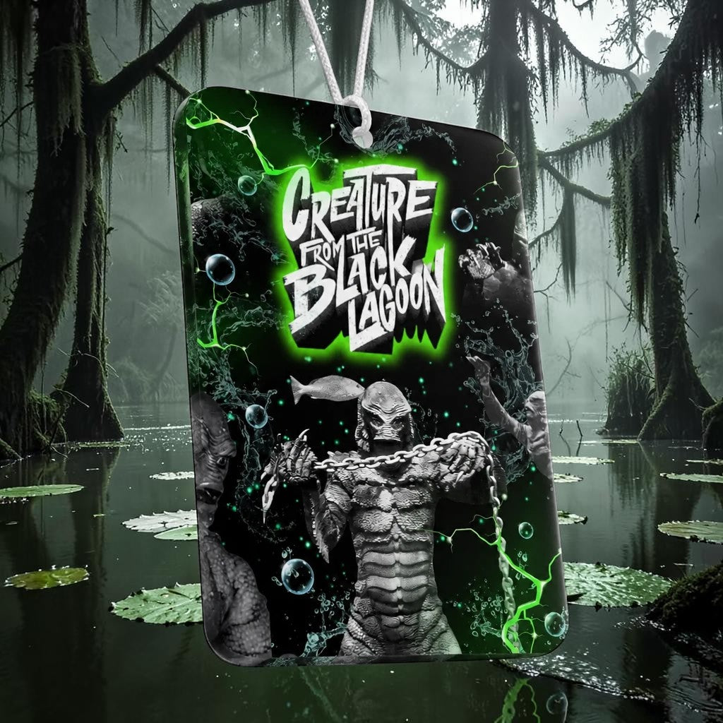 Halloween-Emporium Creature from the Black Lagoon air freshener with green swamp graphics and a rose scent.