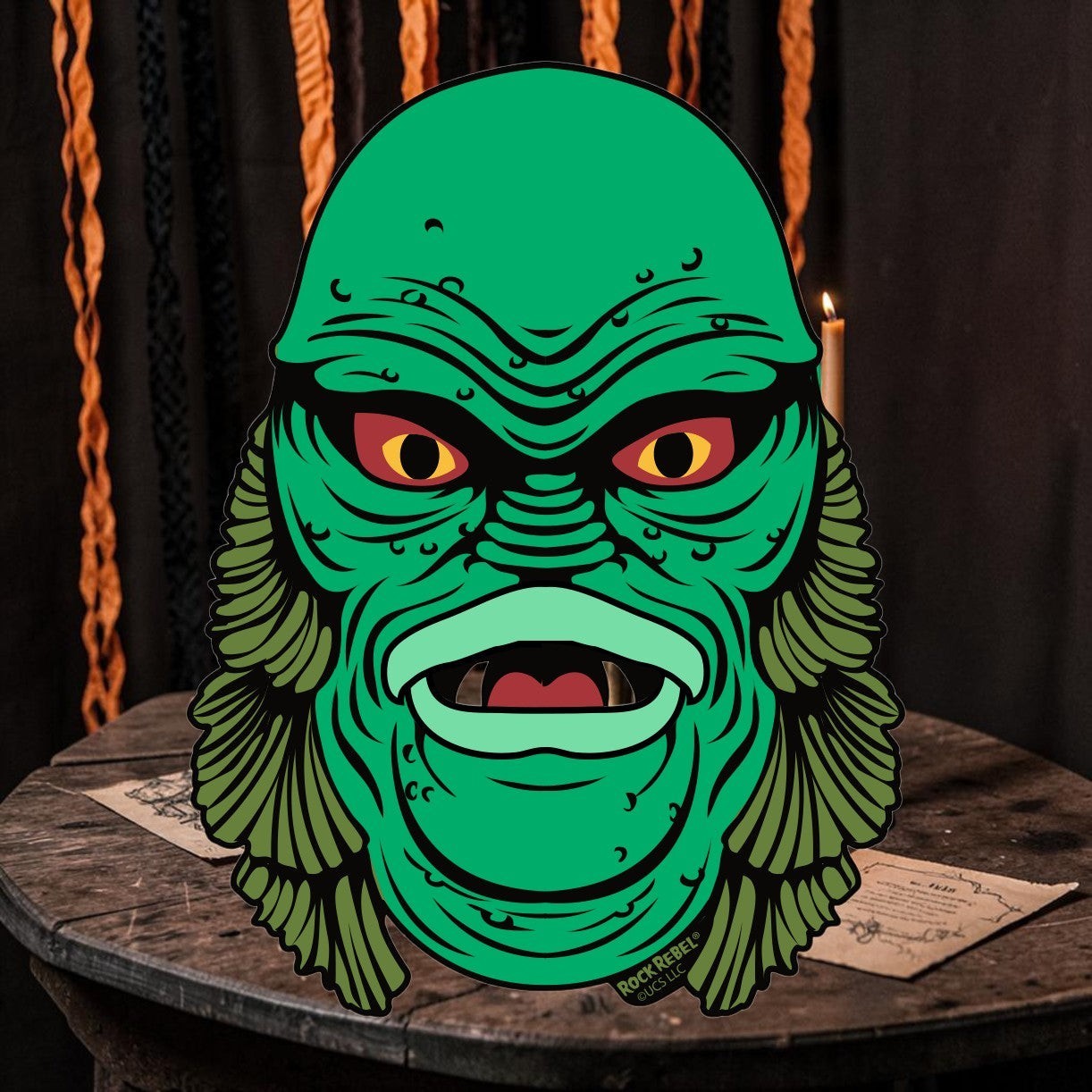 Halloween-Emporium 4-inch Creature sticker featuring a detailed green swamp monster with intense eyes and textured scales.