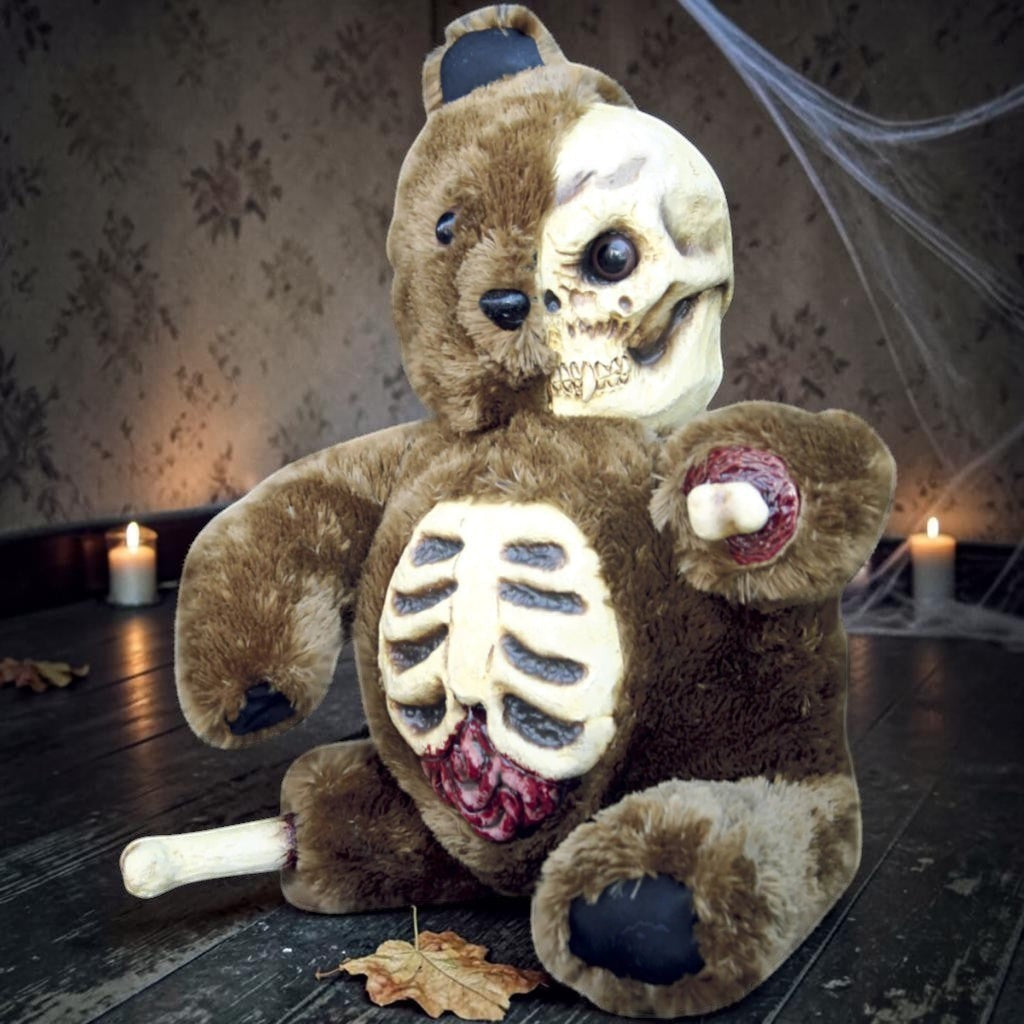 Halloween-Emporium Creepy Little Teddy plush with brown fur, exposed skull face, ribcage, and detached bone limb.