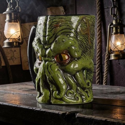 Halloween-Emporium Cthulhu ceramic mug with 3D green tentacle design and black handle on a rustic wooden table.