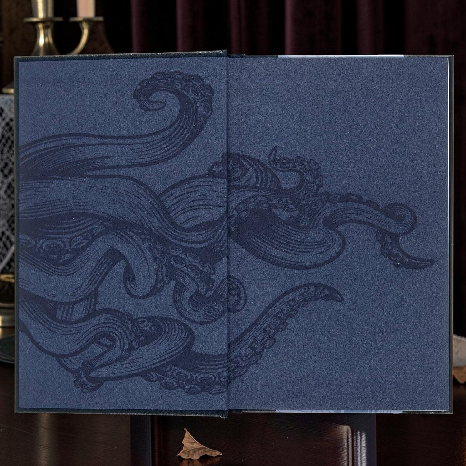 Halloween-Emporium The Call of Cthulhu hardcover book featuring a dark blue endpaper with intricate tentacle art