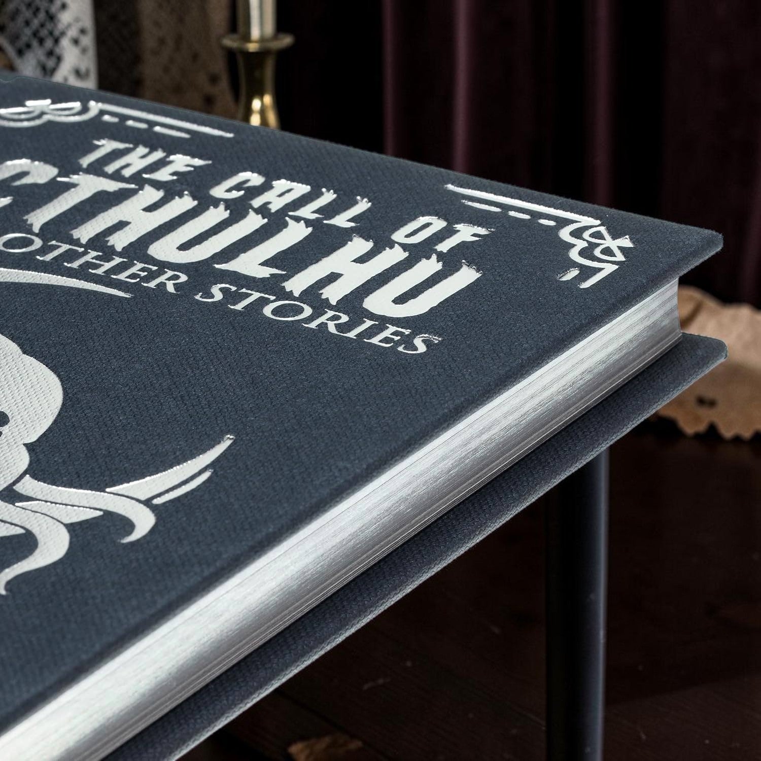 Halloween-Emporium The Call of Cthulhu hardcover book with silver embossed cover and gilded page edges.