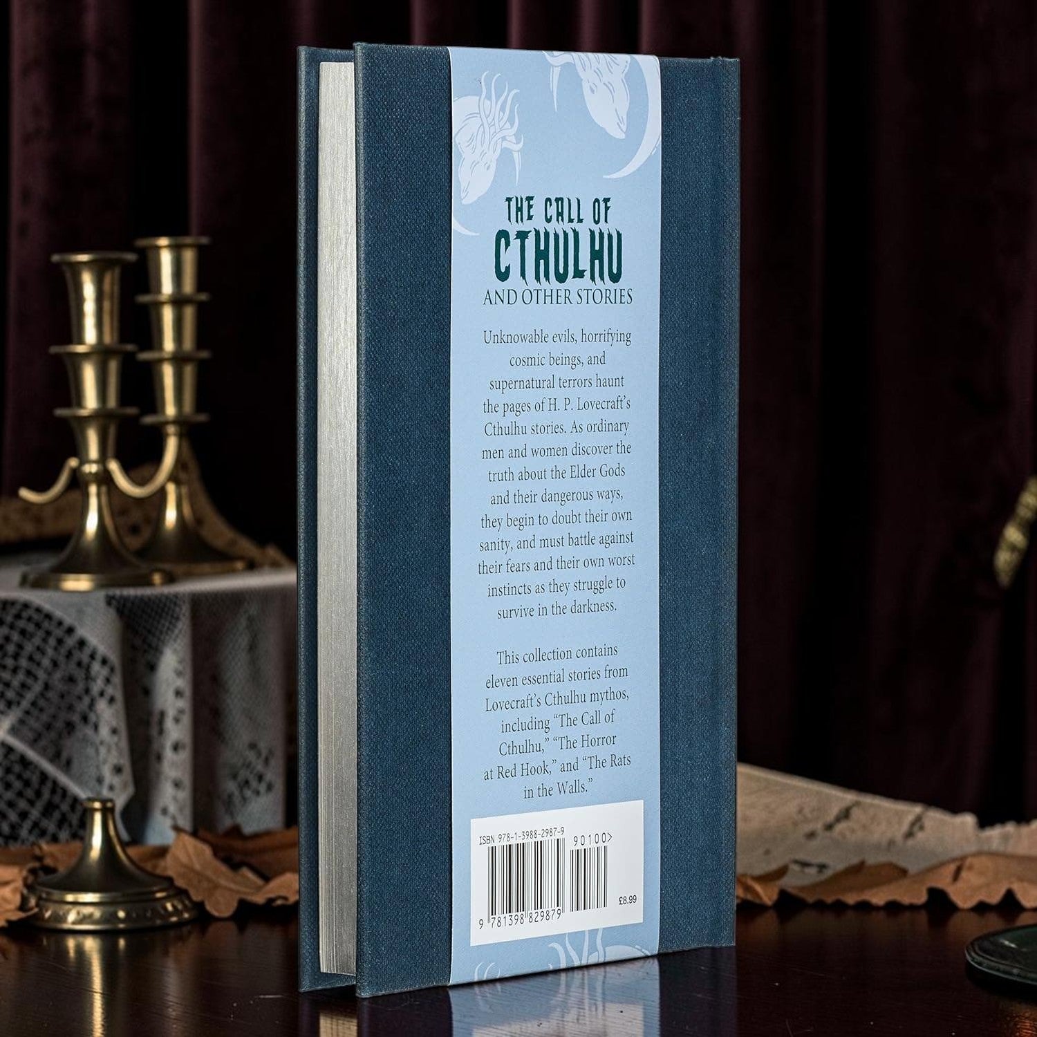 Halloween-Emporium The Call of Cthulhu hardcover book back cover with blue cloth binding and silver embossed details.