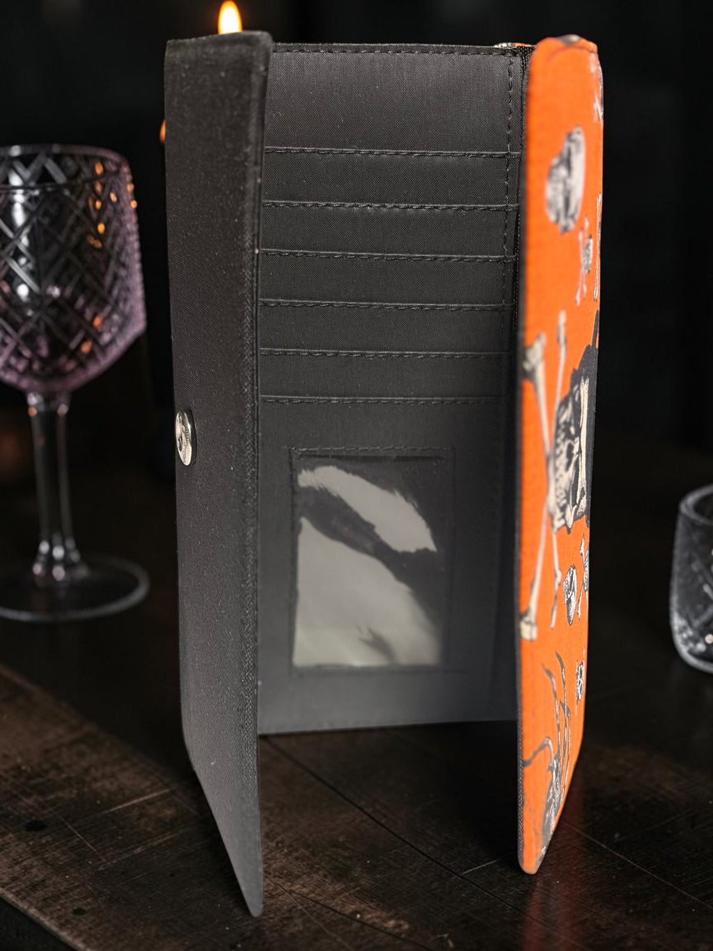 Halloween-Emporium Deadly Apothecary clutch wallet with orange skull print and black interior card slots