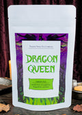 Halloween-Emporium Dragon Queen green tea blend in a white pouch with Maleficent-themed purple and green label art.