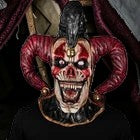 Halloween-Emporium hand-painted latex evil jester mask with extended neck and grotesque features for horror cosplay.