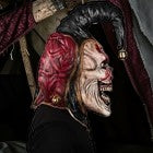 Halloween-Emporium hand-sculpted latex evil jester mask with extended neck and detailed grotesque features.