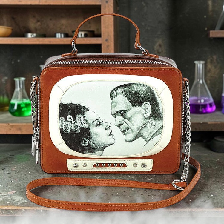 Halloween-Emporium Frankenstein and Bride glow in the dark retro TV shaped crossbody bag with chain strap