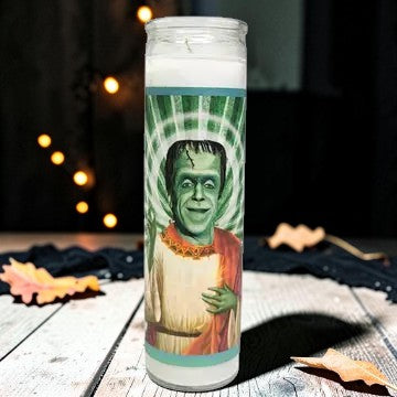 Halloween-Emporium 8-inch white wax devotional candle featuring Frankenstein monster pop art in a glass container.