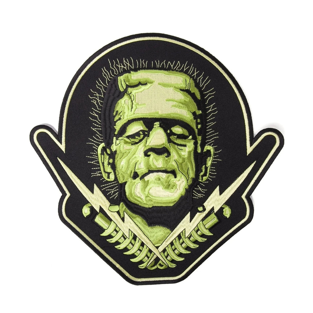 Halloween-Emporium large Frankenstein embroidered iron-on patch with lightning bolt details on a black background.