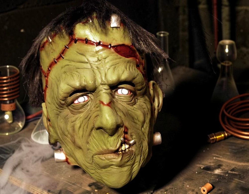 Halloween-Emporium Frankenstein's Monster full latex mask with olive skin, surgical stitches, and metallic neck bolts.