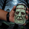 Halloween-Emporium Franky monster can cover with realistic green skin, forehead stitches, and detailed facial features.