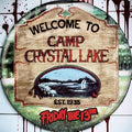 Halloween-Emporium Friday the 13th Camp Crystal Lake button featuring a rustic sign design on a blood-splattered wall.