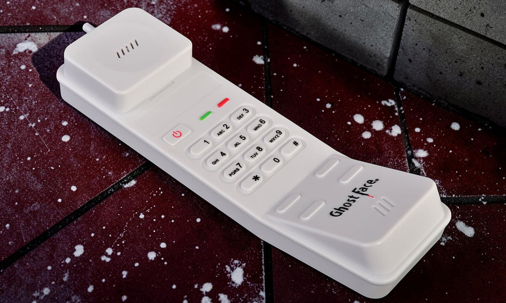 Halloween-Emporium Ghost Face white plastic prop phone with keypad and ringing sound effect for horror costumes