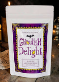Halloween-Emporium Ghoulish Delight black tea pouch with purple and yellow gothic label featuring a bat illustration.